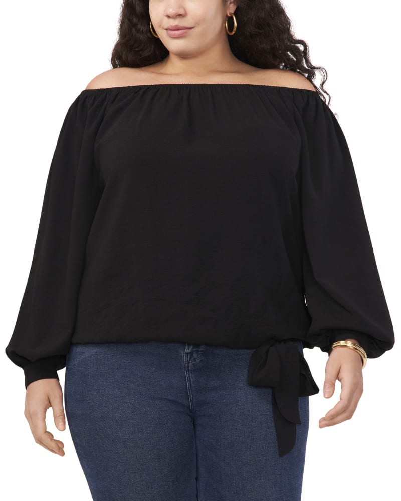 Front of a model wearing a size 3X TIE FRONT OFF THE SHOULDER BLOUSE in RICH BLACK by Vince Camuto. | dia_product_style_image_id:304555